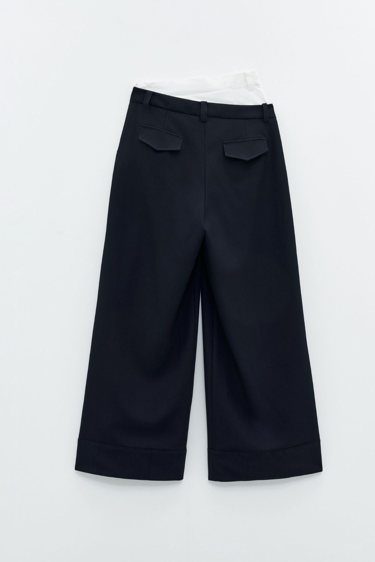 Pantaloni a vita alta combinato a contrasto.   Eleh