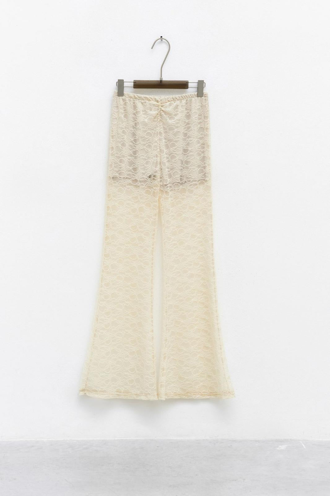 Pantaloni a zampa in pizzo beige - Lumina